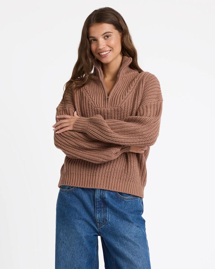 Image of a model wearing Outerwear. Product name - Roxy Womens So Cozy Half Zip Jumper Mocha in Mocha colour by brand - Roxy