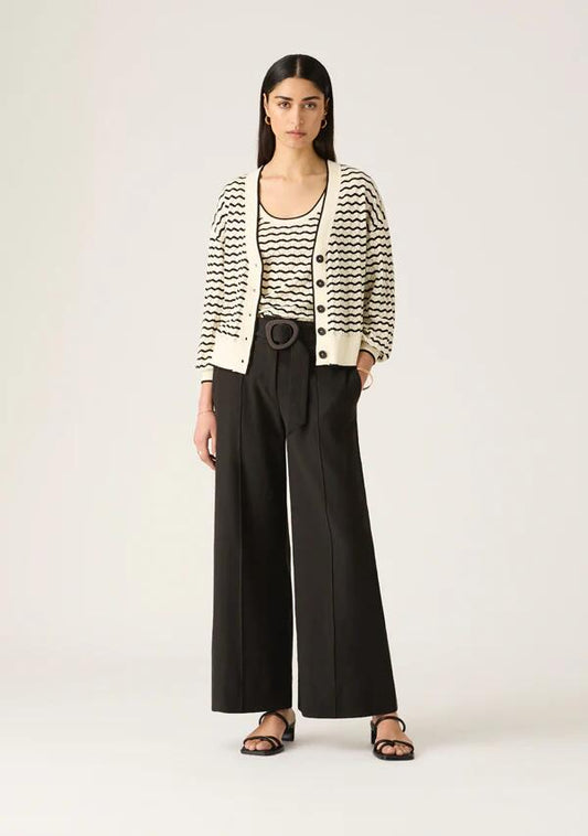 Image of a model wearing Outerwear. Productname: Elara Knit Cardigan in Black And White Stripe colour by brand - MOS The Label