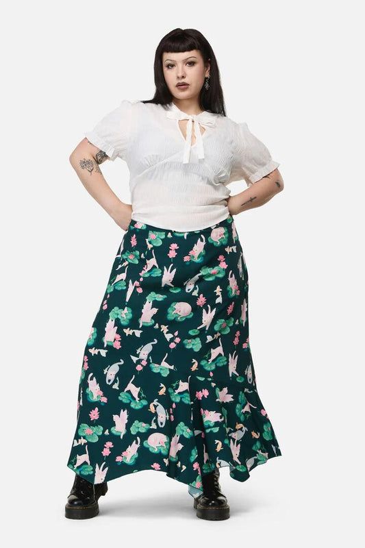Image of a model wearing Skirts. Productname: Curve Lilycat Cottagcore Midi Skirt in Green colour by brand - Dangerfield