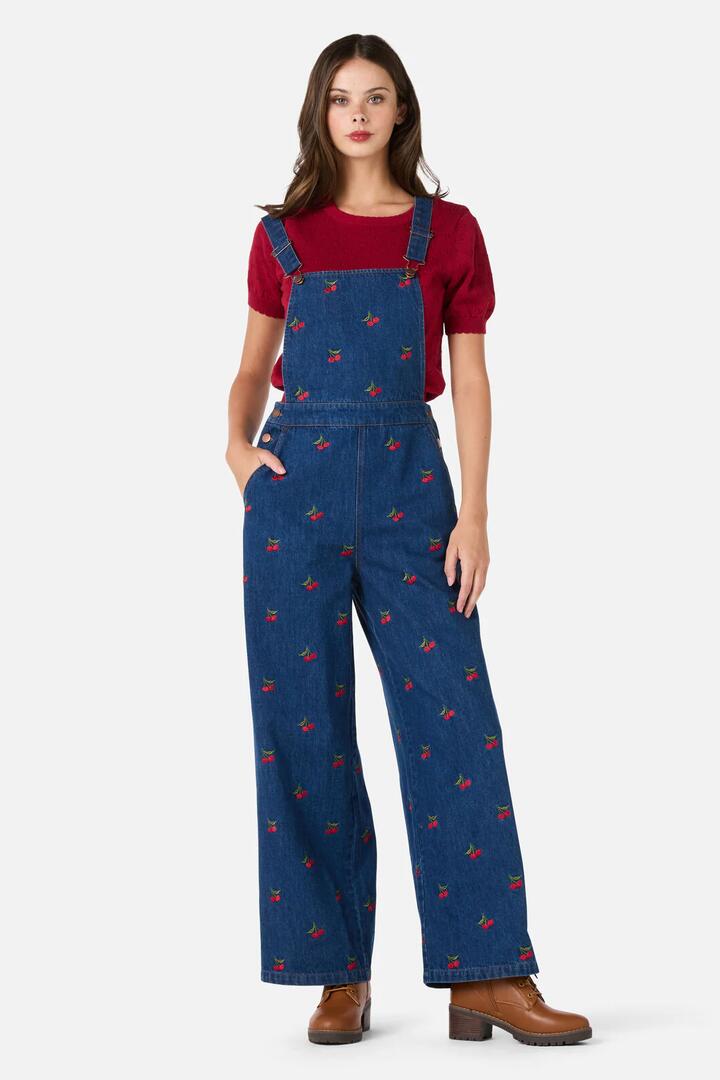 Image of a model wearing Pants. Productname: Cherry Embroidered Overall in Blue Denim colour by brand - Princess Highway