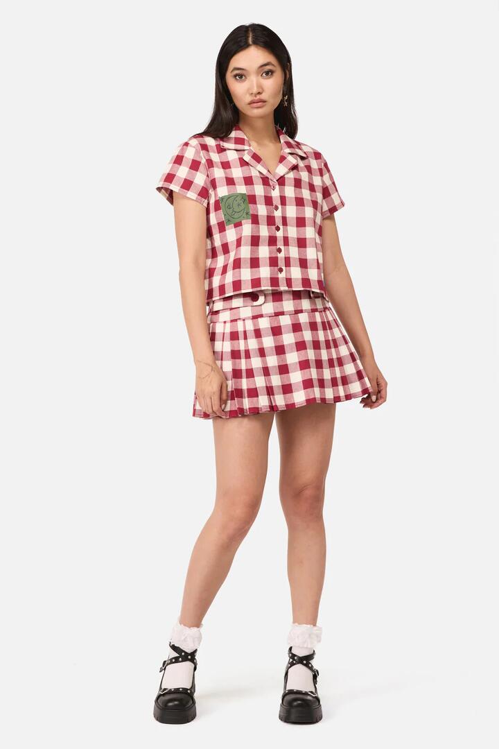 Image of a model wearing Skirts. Productname: Check It Mini Skort in Red/Cream colour by brand - Dangerfield