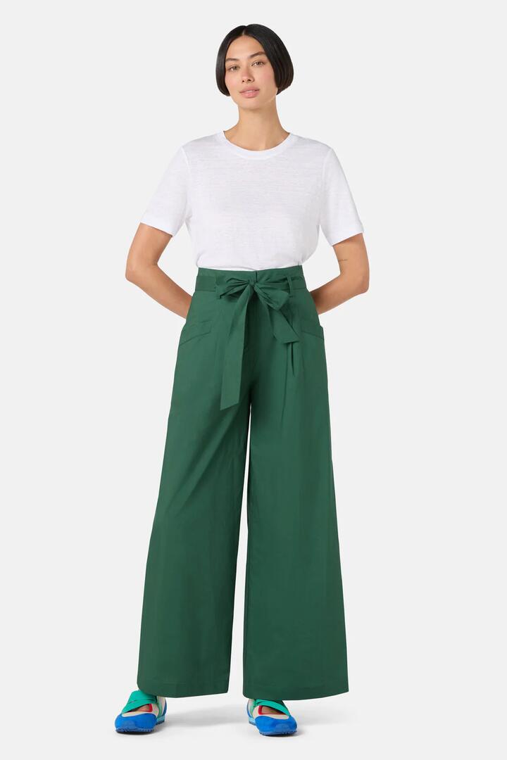 Image of a model wearing Pants. Product name - Rebecca Tailored Wide Leg Pant in Green colour by brand - Gorman