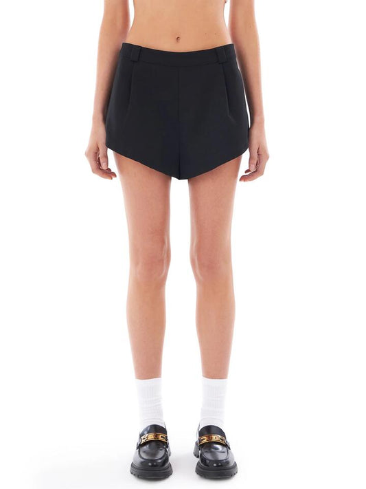Image of a model wearing Shorts. Productname: Felle Mini Tailored Short in Black colour by brand - Felle
