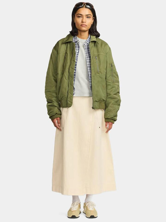 Image of a model wearing Skirts. Productname: Larriet Wrap Skirt in Natural colour by brand - Larriet