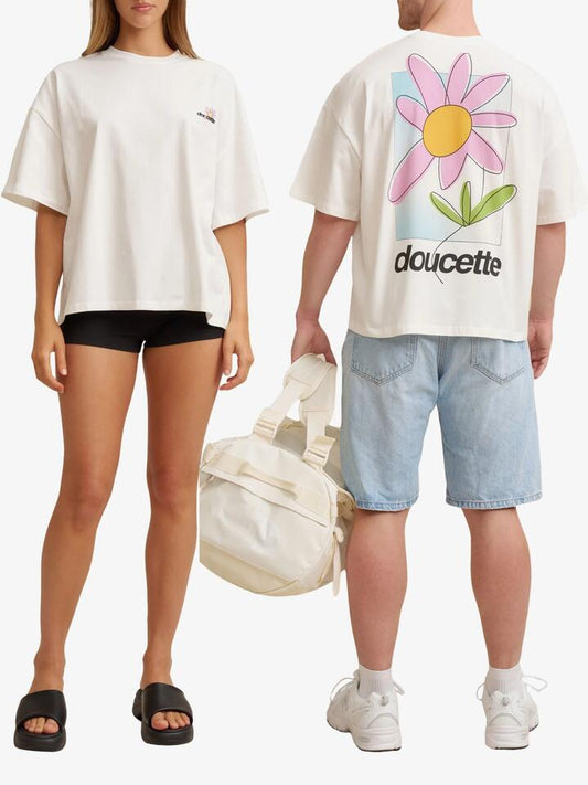 Image of a model wearing Tops. Productname: Doucette Unisex Daisy Compact Tee in Ivory colour by brand - Doucette