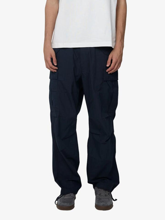 Image of a model wearing Pants. Productname: Article One Flight Cargo Pants in Navy colour by brand - Article One