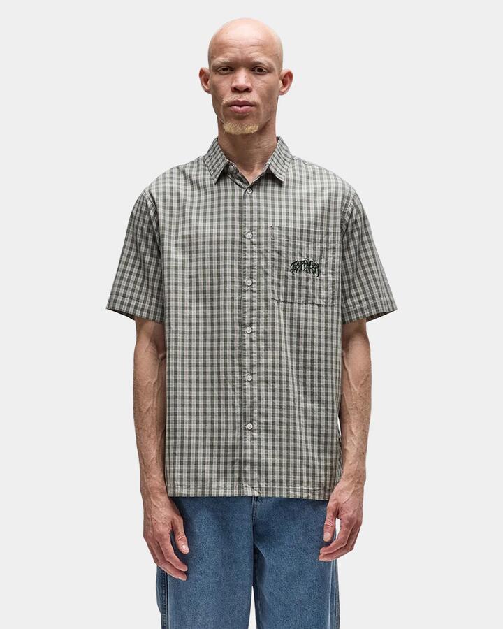 Image of a model wearing Tops. Productname: former Mens Vivian Check Short Sleeve Shirt Pine - in Pine colour by brand - Former