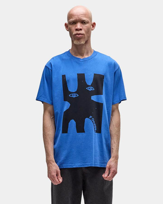 Image of a model wearing Tops. Productname: former Mens Enigma T-Shirt Cobalt - in Cobalt colour by brand - Former