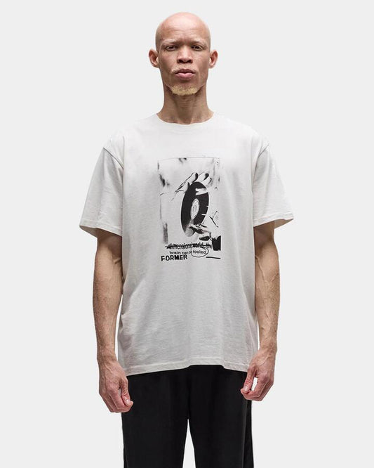 Image of a model wearing Tops. Productname: former Mens Cease T-Shirt Bone - in Bone colour by brand - Former