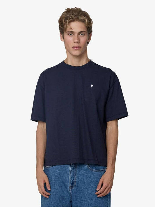 Image of a model wearing Tops. Productname: Article One Small Serif Cropped Tee in Navy colour by brand - Article One