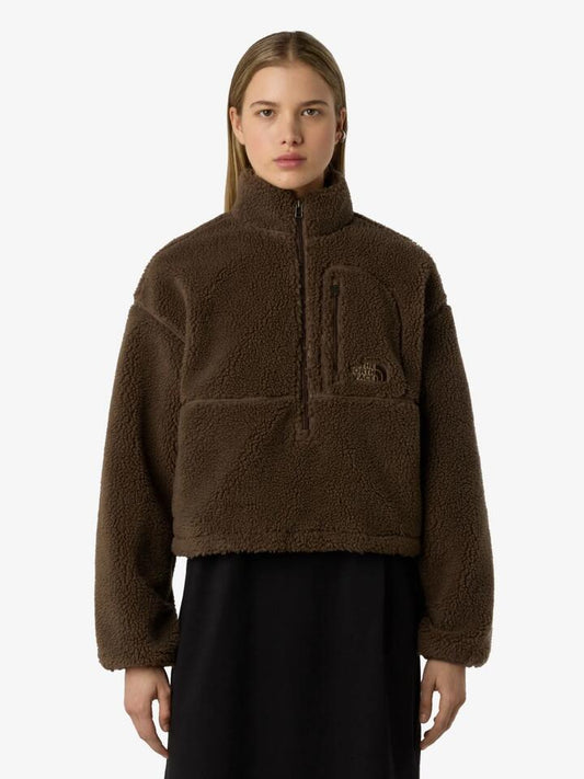Image of a model wearing Outerwear. Productname: The North Face Women's Extreme Pile 2 Pullover in Smokey Brown colour by brand - The North Face