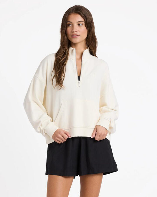 Image of a model wearing Outerwear. Productname: roxy Womens Movin Up Half Zip Fleece Jumper Bone - in Bone colour by brand - Roxy