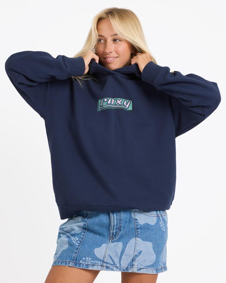 Image of a model wearing Outerwear. Product name - Roxy Womens Going Back Pullover Hoodie Indigo in Indigo colour by brand - Roxy
