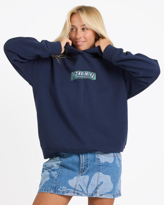 Image of a model wearing Outerwear. Product name - Roxy Womens Going Back Pullover Hoodie Indigo in Indigo colour by brand - Roxy