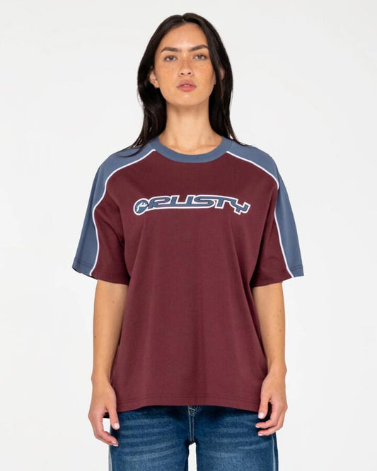 Image of a model wearing Tops. Productname: rusty Womens Timmy Target Oversized T-Shirt Cranberry - in Cranberry colour by brand - Rusty