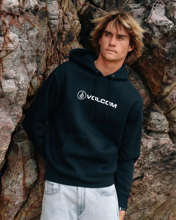 Image of a model wearing Outerwear. Product name - Volcom Mens Stonicon Pullover Hoodie Black in Black colour by brand - Volcom