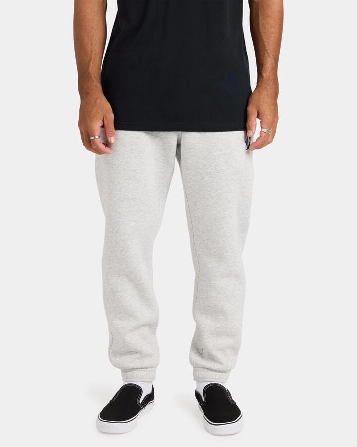 Image of a model wearing Pants. Product name - Volcom Mens Vologo Trackpants Heather Grey in Heather Grey colour by brand - Volcom