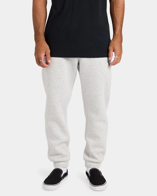 Image of a model wearing Pants. Product name - Volcom Mens Vologo Trackpants Heather Grey in Heather Grey colour by brand - Volcom