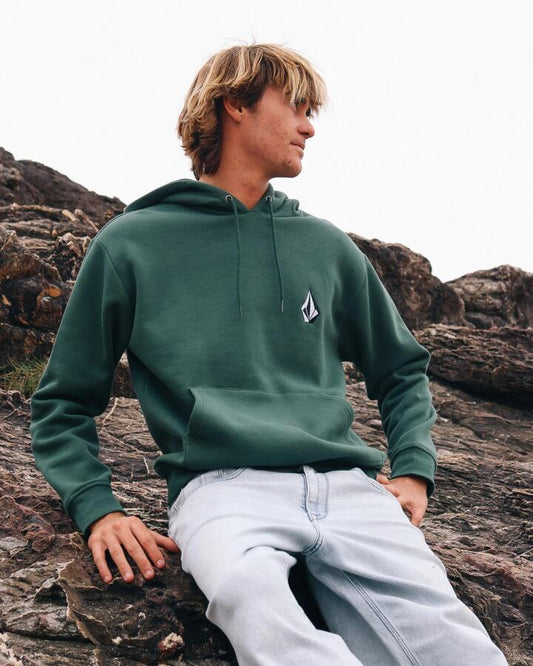 Image of a model wearing Outerwear. Productname: volcom Mens Vologo Pullover Hoodie Alpine - in Alpine colour by brand - Volcom