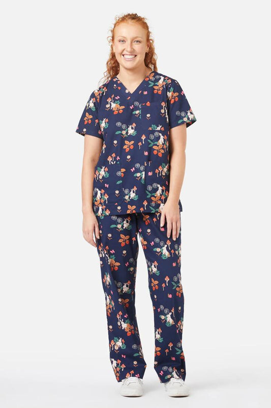 Image of a model wearing Uniforms & Workwear. Productname: Wonderland Scrub Set in Navy colour by brand - Princess Highway