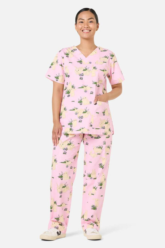 Image of a model wearing Uniforms & Workwear. Productname: Hop Hop Scrub Set in Pink colour by brand - Scrubs With Love