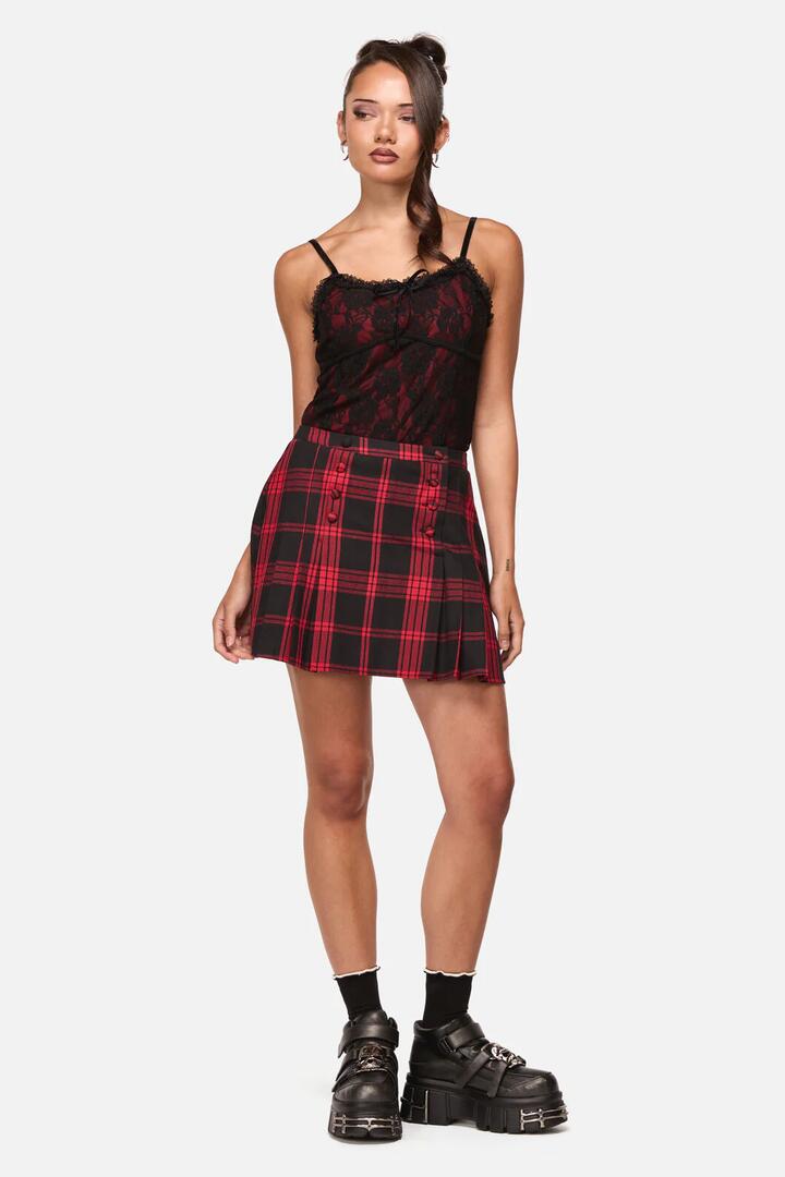 Image of a model wearing Skirts. Productname: Suffer Tartan Skort in Red/Black colour by brand - Black Friday