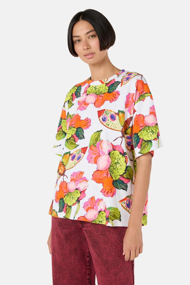 Image of a model wearing Tops. Productname: Elara Yardage Oversized Tee in Print colour by brand - Gorman