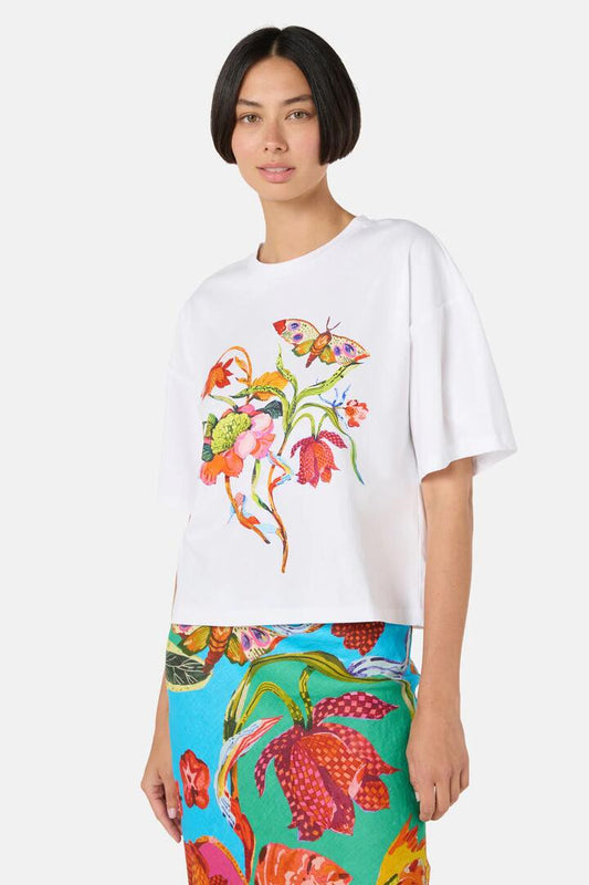 Image of a model wearing Tops. Productname: Elara Placement Relaxed Tee in White colour by brand - Gorman