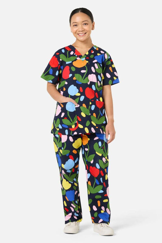 Image of a model wearing Uniforms & Workwear. Product name - Confetti Tulip Scrub Set in Navy colour by brand - Gorman