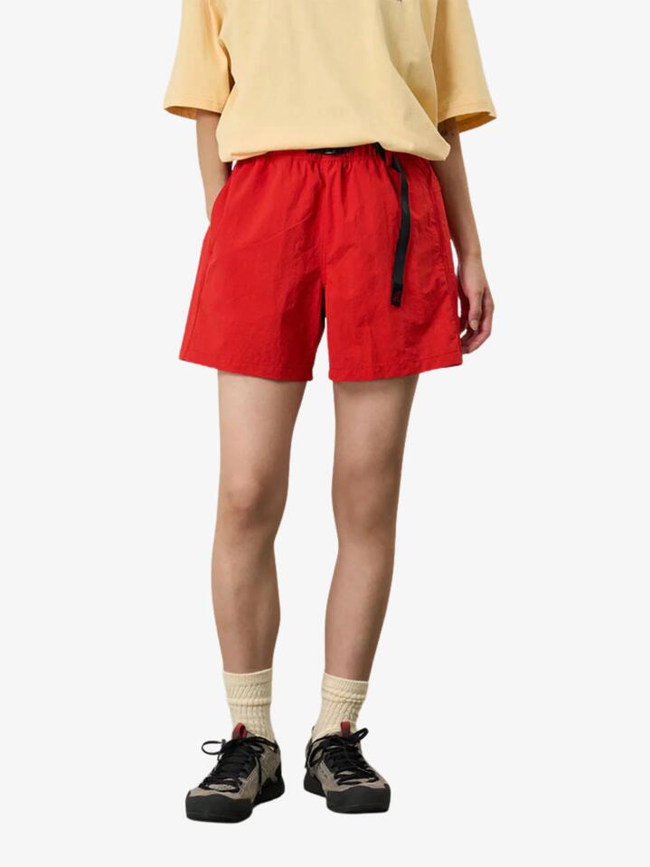 Image of a model wearing Shorts. Productname: Gramicci Women's Nylon Active Short in Burnt Orange colour by brand - Gramicci