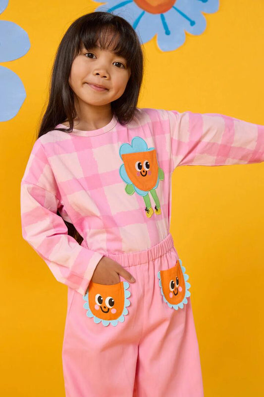 Image of a model wearing Tops. Product name - Walking Daisy Kids Top in Pink colour by brand - Gorman