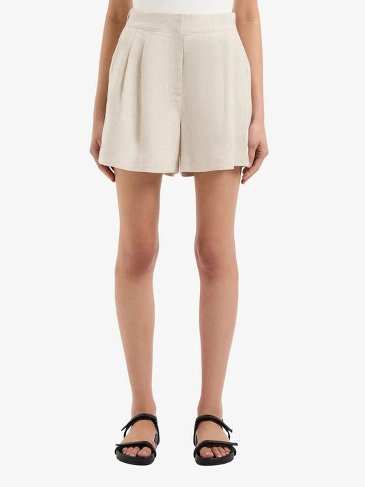 Image of a model wearing Shorts. Productname: Nude Lucy Thilda Tailored Shorts in Natural colour by brand - Nude Lucy