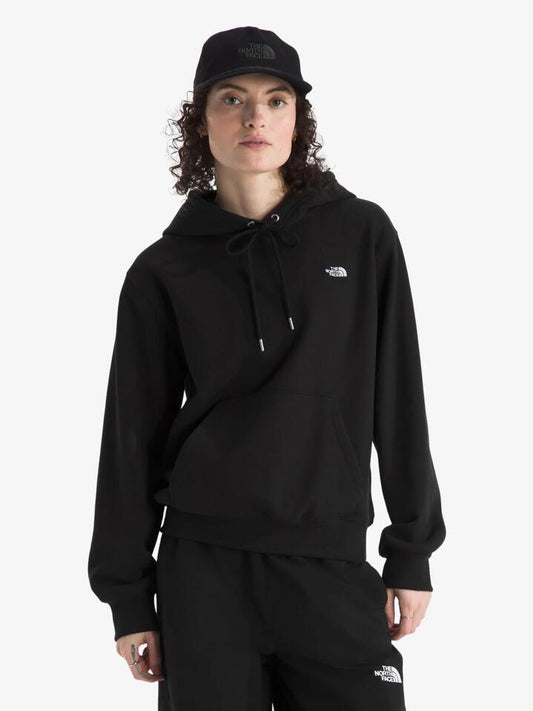 Image of a model wearing Outerwear. Productname: The North Face Womenâs TNF Essential Simple Dome Relaxed Hoodie in Tnf Black colour by brand - The North Face