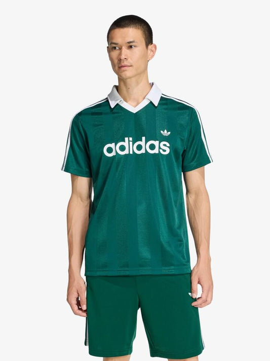Image of a model wearing Tops. Productname: Adidas Archive Collar Engineered Jersey in Collegiate Green colour by brand - Adidas