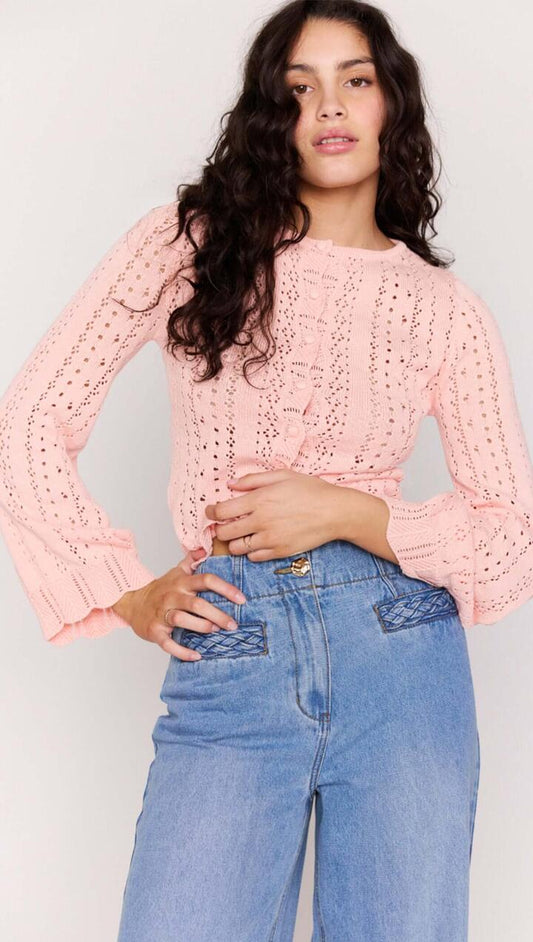 Image of a model wearing Tops. Product name - Soft Pink Cotton Pointelle Cardigan in Soft Pink colour by brand - MINKPINK
