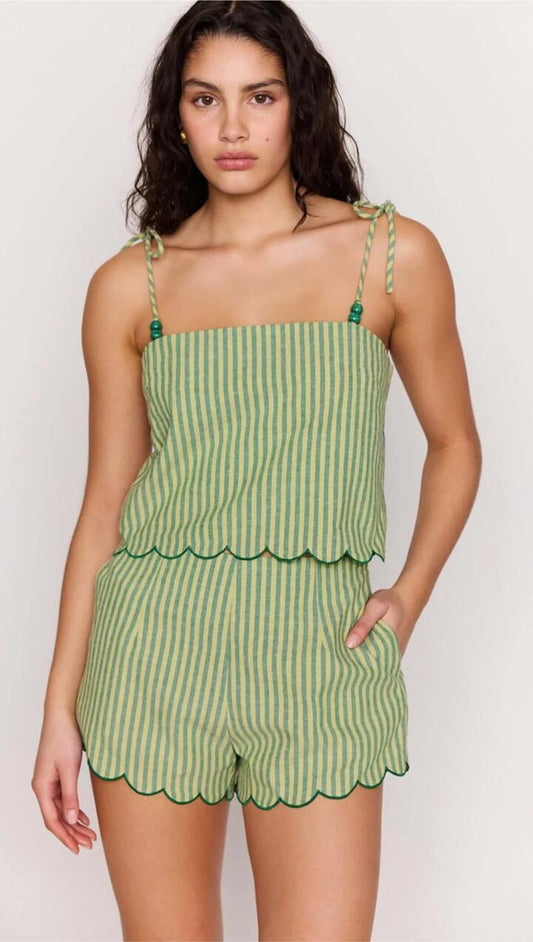 Image of a model wearing Tops. Product name - Green Striped Linen Blend Scallop Cami Top in Green Stripe colour by brand - MINKPINK