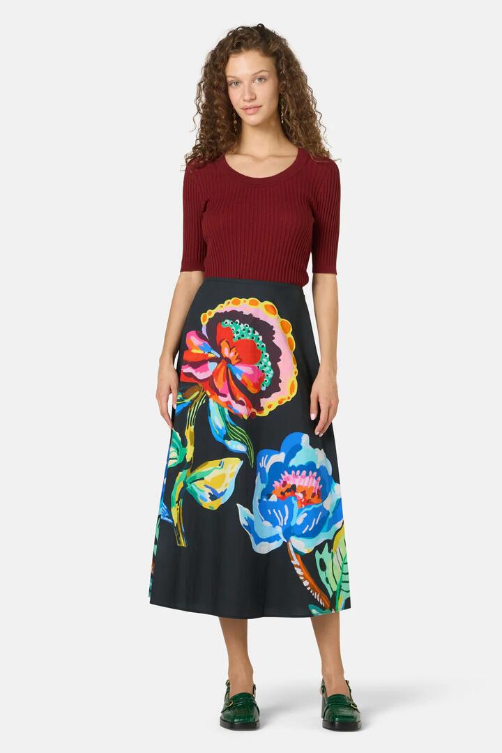 Image of a model wearing Skirts. Product name - Floral Symphony Circle Skirt in Print colour by brand - Gorman