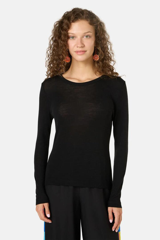 Image of a model wearing Tops. Productname: Merino Wool Crew Neck Top in Black colour by brand - Gorman