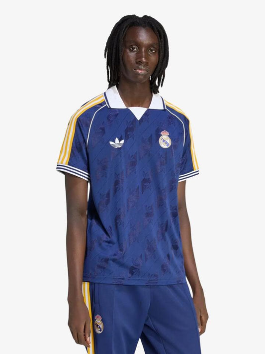 Image of a model wearing Tops. Productname: Adidas Real Madrid Originals Jersey in Dark Blue colour by brand - Adidas