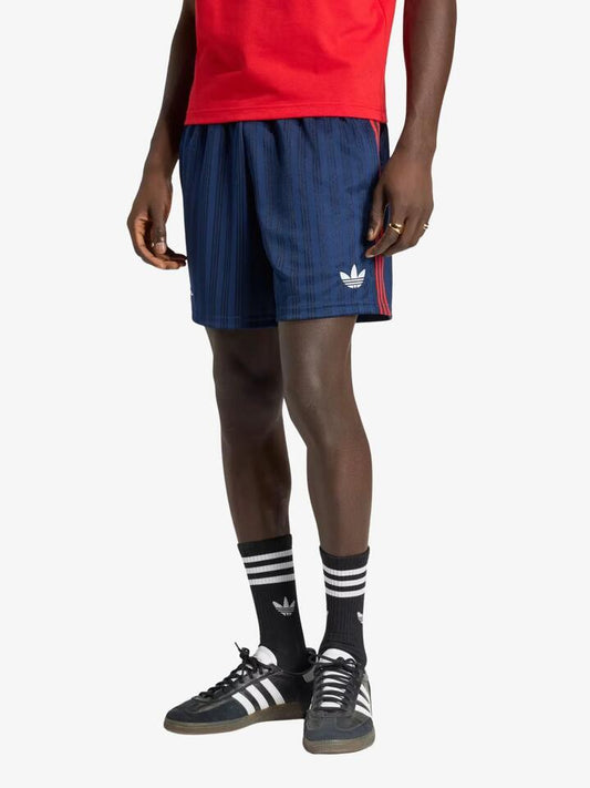Image of a model wearing Shorts. Productname: Adidas Arsenal FC Originals Shorts in Night Indigo colour by brand - Adidas
