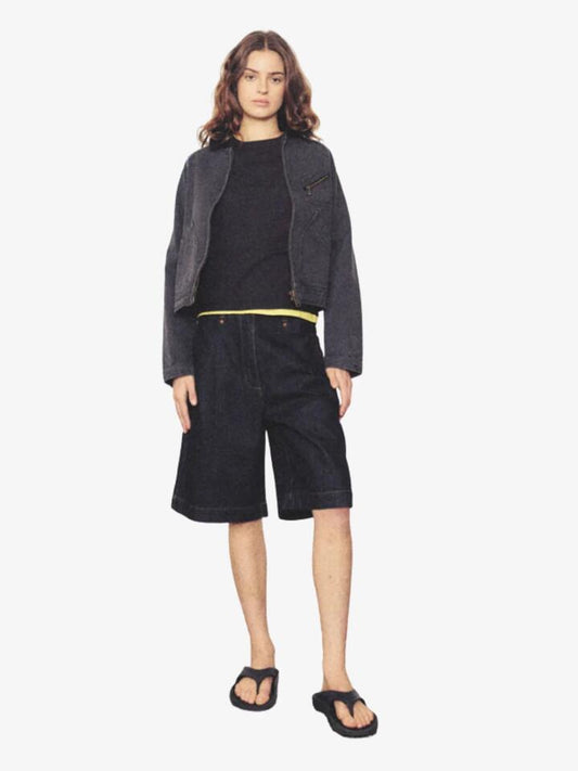 Image of a model wearing Pants. Productname: Larriet Chino Short in Indigo Denim colour by brand - Larriet