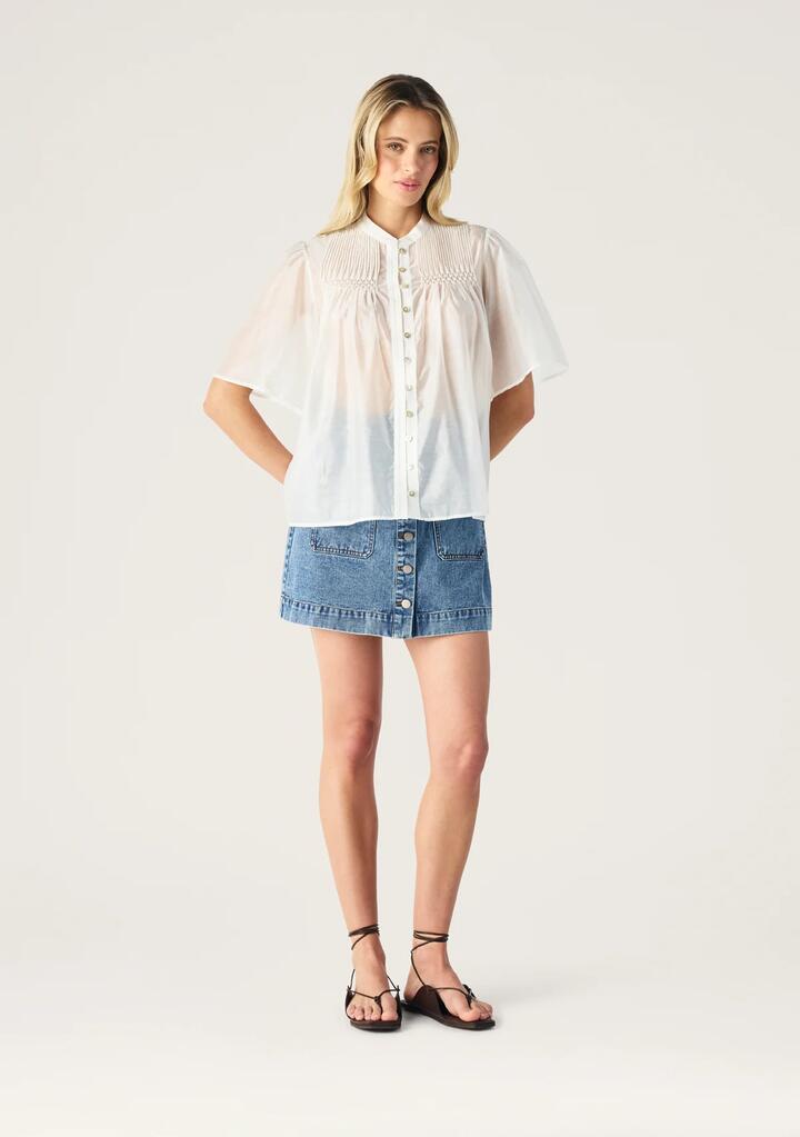Image of a model wearing Tops. Productname: Romy Short Sleeve Blouse | MOS The Label in Ivory colour by brand - MOS The Label