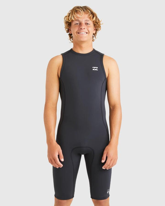 Image of a model wearing Tops. Productname: Billabong Mens 2/2 Absolute Flatlock Wetsuit Black - in Black colour by brand - Billabong