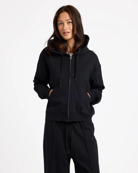 Image of a model wearing Outerwear. Productname: von Zipper Womens Spencer Corp Zip Up Hoodie Black - in Black colour by brand - von Zipper