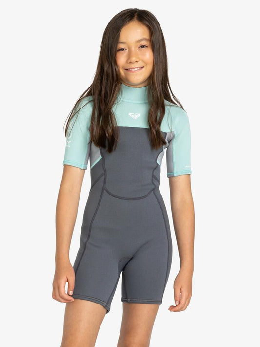 Image of a model wearing Tops. Productname: Roxy Girls 4-16 2/2Mm Prologue Back Zip Short Sleeve Springsuit Ice Green - in Ice Green colour by brand - Roxy