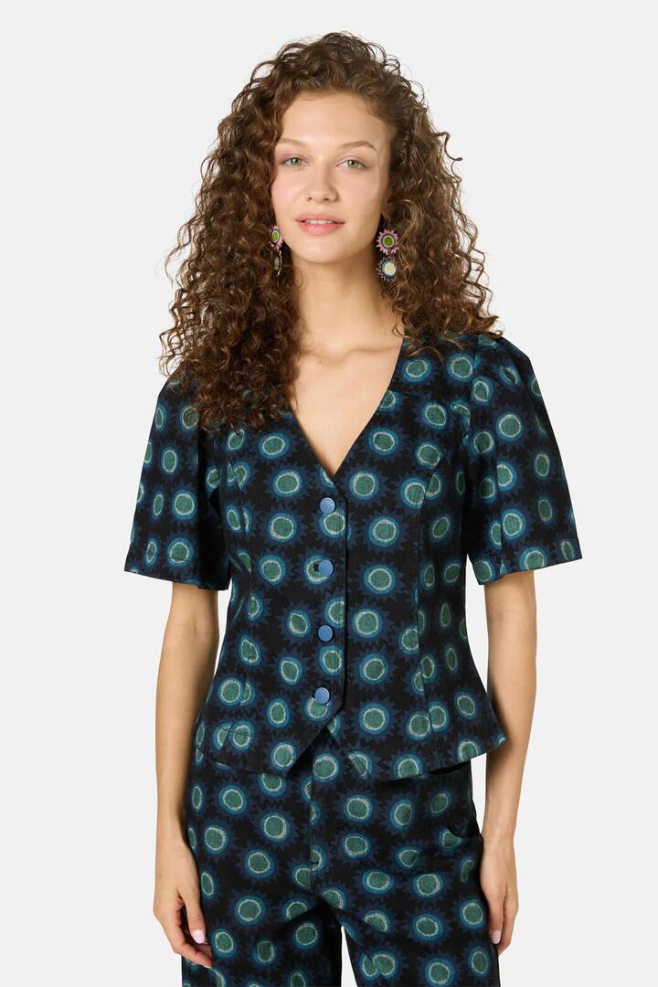 Image of a model wearing Tops. Product name - Royal Spot Denim Top in Print colour by brand - Gorman