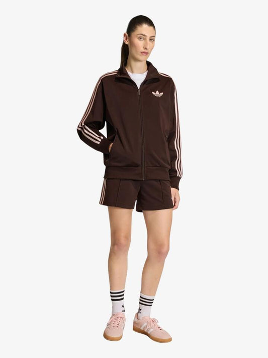 Image of a model wearing Shorts. Productname: Adidas Firebird Classic Shorts in Aurora Coffee/Sandy Pink colour by brand - Adidas