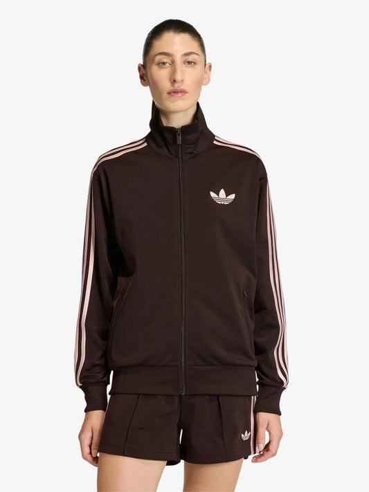 Image of a model wearing Tops. Productname: Adidas Firedbird Loose Track Top in Aurora Coffee/Sandy Pink colour by brand - Adidas