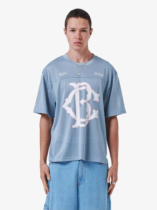 Image of a model wearing Tops. Productname: Barney Cools BC Jersey in Sky colour by brand - Barney Cools