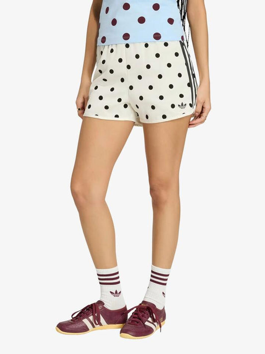 Image of a model wearing Shorts. Productname: Adidas Polka Dots Sprinter Shorts in Off White colour by brand - Adidas